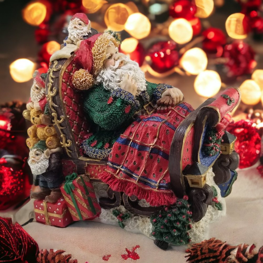 Santa in a Red Sleight Bed Resin Holiday Décor with Elves, Presents, And Toys - Picture 14 of 15